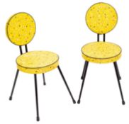 A pair of yellow vinyl covered side chai