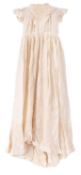 A Victorian silk and embroidered christening gown, circa 1899.