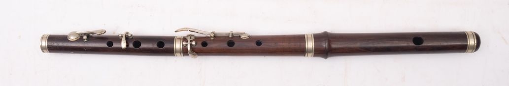 A vintage rosewood and nickel Irish Band Flute maker Besson and Co, 198 Euston Road, London,