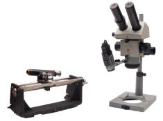 A cased travelling microscope, maker J Swift & Son serial number 18830,