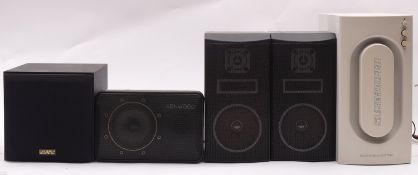 A Cambridge Soundworks SW320 speaker, a Kenwood Model CM-5 (left) speaker,