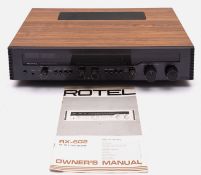 A Rotel RX-602 AM/FM Stereo receiver, together with instruction manual.