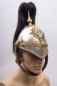 An 1871 pattern First Dragoons helmet, black horse hair plume on a brass spike with cross piece,