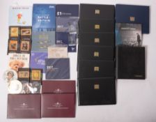 A box containing modern United Kingdom coin sets and Westminster commemorative coin covers,