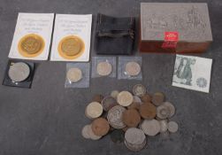 A collection of British coins including 1891 crown, 1890 double florin, 1826 shilling,