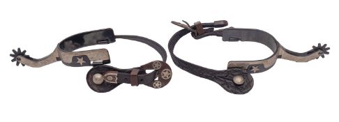 A pair of late 20th Century, blued steel, leather and decorated with white metal spurs, not marked,