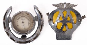 A silver plated horseshoe mounted Aneroid barometer, the silvered vernier dial numbered K.