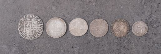 An Elizabeth I shilling, two George II sixpences, 1746 Luna/1757, 1787 sixpence, 1746 threepence,