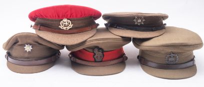 Five British Army peaked caps, Devonshire Regiment, Dorsetshire, Royal Anglian,