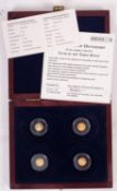 A boxed Year Set of three Kings, four gold coins.