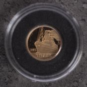 A small gold coin commemorating the sinking of the Titanic .