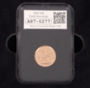 A cased 2016 gold sovereign.
