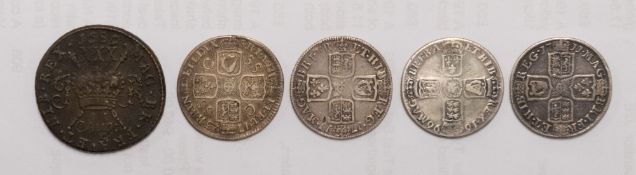 A James II gunmoney half crown date 'Aug 1st' , two 1711 Queen Anne shillings,
