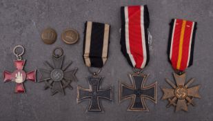 A WWI Iron Cross, together with a Hanseatic Cross,