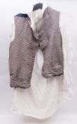 An early 20th century footman's waistcoat, together with a white cotton nightshirt..