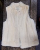 A white Mink fur gillet.