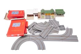 Tri-ang Minic Motorways. A small collection of buildings and empty boxes, etc.