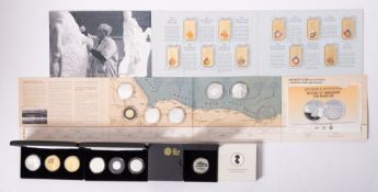 A Jubilee Mint £5 coin set, Jubilee Mint solid slver George and the Dragon gold set, D-Day £5 coin,