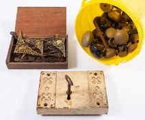 A Victorian rim lock with key, together with a quantity of brass door knobs, cup castors,