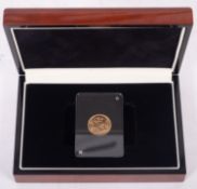A cased 1957 sovereign.