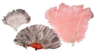 An early 20th century bone and pink ostrich feather fan,