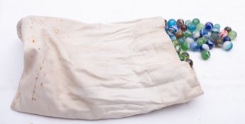 A collection of early 20th century and later marbles.