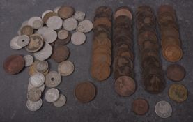 A collection of world coins including silver.