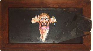 'Ogre with moving eyes' Maker unknown (6 7/8 x 3 7/8 x 3/8 inches), single slip