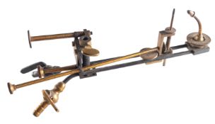 A lacquered brass 'Improved Oxy-Hydrogen Lime Light Illuminant' , maker Kersham, with plaque as