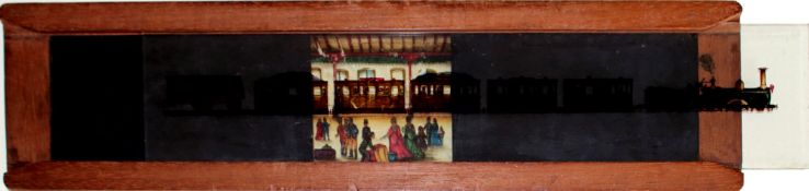 'Steam train passing through railway station' [panoramic image passes square aperture] Maker unknown