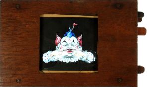 'Clown pulling faces' [hands and facial features move in many combinations] Maker unknown (7 x 4 3/8