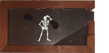 'Skeleton juggling head' Maker unknown (7 1/4 x 4 x 3/8 inches), single slip