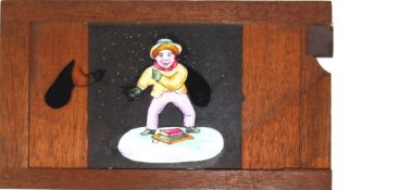 'Keeping warm in the snow' [arms move] Maker unknown (7 x 4 x 3/8 inches), single slip