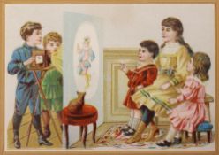 A late 19th century trade card of children playing with magic lantern. Publisher unknown, circa