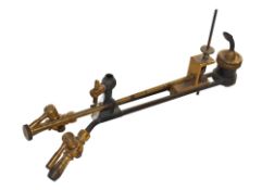 A brass Blow-Through jet. oxygen and hydrogen gas are admitted through sperate inlet tubes and mixed