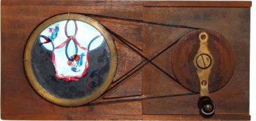 'Circus acrobats' Maker unknown (9 3/8 x 4 1/2 x 1/2 inches), double pulley mechanism