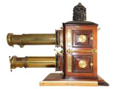 A large biunial showman's lantern, maker A Laverne et Cie, Paris, circa 1895. fluted chimney over