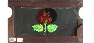 'Rose opens to reveal Cupid' Maker unknown (7 x 4 x 3/8 inches), double slip