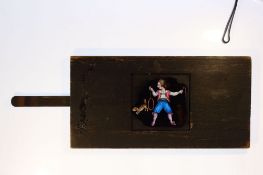 'Dog jumps through hoop' Maker unknown; 21.5 x 11 x 1cm, single slip.