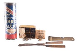 A pair of brass lime tongs, with fold out piercer, together with a pair of wooden handles lime