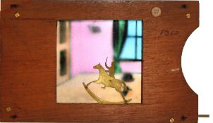 'Rocking horse in nursery' [horse pivots on rocker, rider pivots on horse] Maker unknown (7 x 4 1/