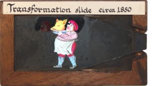 'Waiter and pig exchange heads' Maker unknown (6 3/4 x 4 x 3/8 inches),