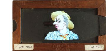 'Growing nose' [nose grows, eyes move side to side] (6 7/8 x 3 5/8 x 3/8 inches), double slip