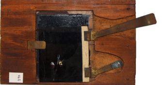 'Man raising lantern on pole' [figure moves up and down] Maker unknown (6 1/2 x 3 7/8 x 3/8 inches),