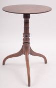 A Regency mahogany circular tripod table