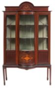 An Edwardian mahogany and inlaid display