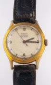 Munwill a gold-plated wristwatch the silvered dial with baton and Roman numerals,