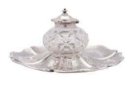 A Victorian silver inkstand, maker Henry Wilkinson & Co John Brashie, London 1885, the shaped