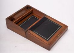 A Victorian walnut and brass inset writing slope, circa 1860; 14cm high, 30cm wide