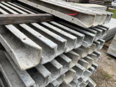 (10) 8' Corners Western aluminum concrete forms, Vertex brick, 6-12 hole pattern. Located in